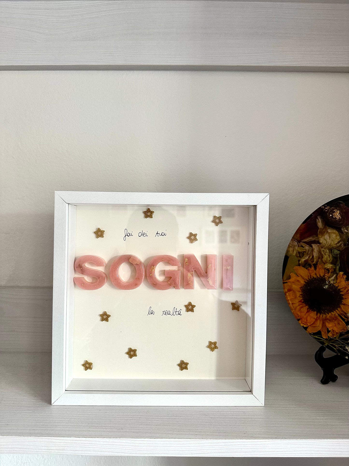 Quadro con scritta in resina